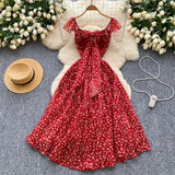 French Sweet Design With A Knotted Bow Tie With Bare Back To The Waist Of A Floral Dress