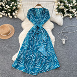 2025 Summer New Small High-End Sense V-Neck Short-Sleeved Waist Irregular Open-Fork Print Dress Women's Long Dress