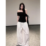 Summer Beautiful Wearing A Suit Girl Little Hot Girl A Word On The Shoulder Wearing White Broad Leg Pants A Complete Set