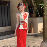 Fashion 2025 Spring And Summer Women's New Seaside Vacation Wind Hanging Neck Vest Sexy Hip Skirt Suit