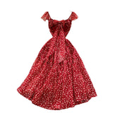 French Sweet Design With A Knotted Bow Tie With Bare Back To The Waist Of A Floral Dress
