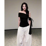 Summer Beautiful Wearing A Suit Girl Little Hot Girl A Word On The Shoulder Wearing White Broad Leg Pants A Complete Set