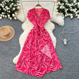 2025 Summer New Small High-End Sense V-Neck Short-Sleeved Waist Irregular Open-Fork Print Dress Women's Long Dress