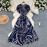 2025 Summer New Small High-End Sense V-Neck Short-Sleeved Waist Irregular Open-Fork Print Dress Women's Long Dress